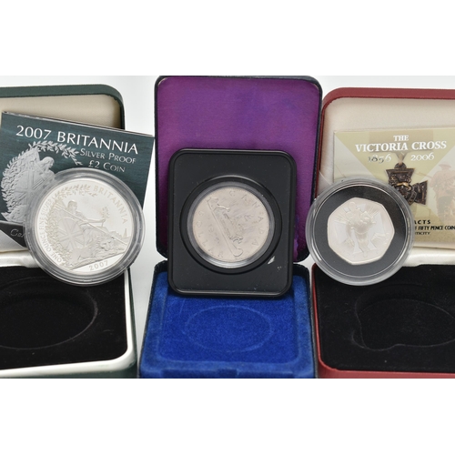 229 - A GROUP OF THREE BOXED SILVER COINS, to include a Royal Mint The Victoria Cross Fifty Pence with Cer... 