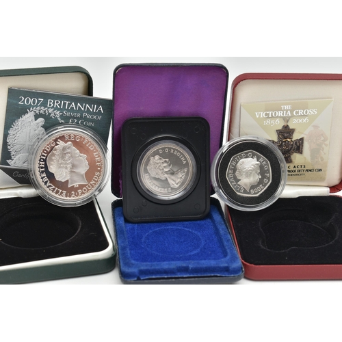 229 - A GROUP OF THREE BOXED SILVER COINS, to include a Royal Mint The Victoria Cross Fifty Pence with Cer... 