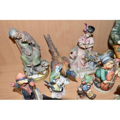 354 - A GROUP OF FIGURES, comprising a Capodimonte figure group of Don Quixote, on horseback, and Sancho P... 