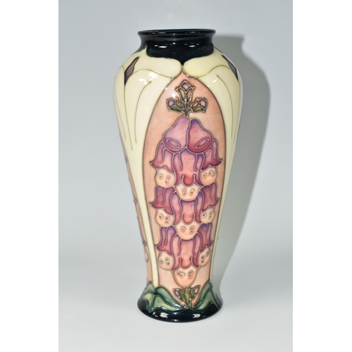 365 - A MOORCROFT POTTERY 'FOXGLOVE' PATTERN TRIAL VASE, of elongated shouldered form, tube lined with pin... 