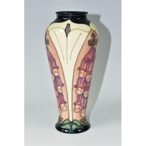 365 - A MOORCROFT POTTERY 'FOXGLOVE' PATTERN TRIAL VASE, of elongated shouldered form, tube lined with pin... 