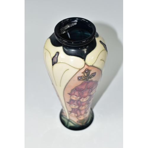 365 - A MOORCROFT POTTERY 'FOXGLOVE' PATTERN TRIAL VASE, of elongated shouldered form, tube lined with pin... 