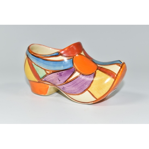 388 - A CLARICE CLIFF SMALL SABOT/CLOG, in Pebbles pattern, painted with colourful geometric design, with ... 