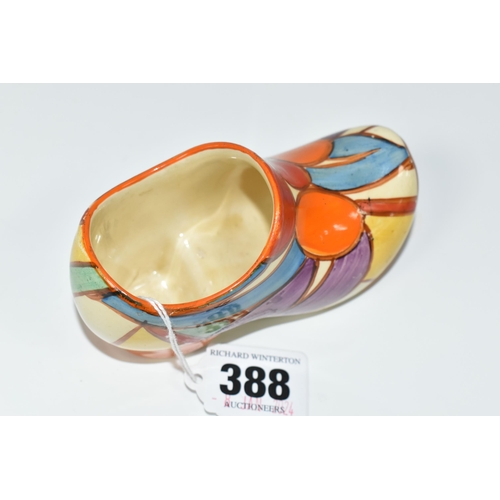 388 - A CLARICE CLIFF SMALL SABOT/CLOG, in Pebbles pattern, painted with colourful geometric design, with ... 