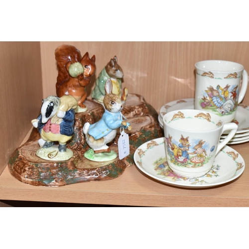 404 - A BESWICK BEATRIX POTTER'S FIGURE STAND WITH FIVE CHARACTERS, comprising 'Squirrel Nutkin' gold gilt... 