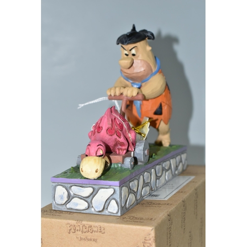 409 - A BOXED ENESCO 'THE FLINTSTONES' FIGURINE, by Jim Shore 4058333 Fred Flintstone 'Mower-A-Saurus' (1)... 