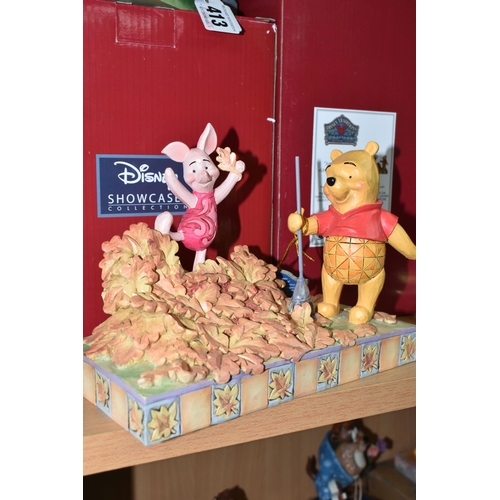 413 - TWO BOXED ENESCO DISNEY TRADITIONS FIGURES, designed by Jim Shore, comprising Winnie The Pooh 'Jumpi... 