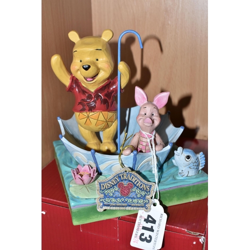 413 - TWO BOXED ENESCO DISNEY TRADITIONS FIGURES, designed by Jim Shore, comprising Winnie The Pooh 'Jumpi... 