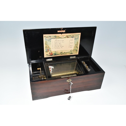 469 - A SIMULATED ROSEWOOD SIX AIR MUSIC BOX, no visible makers marks, the comb and cylinder are intact an... 