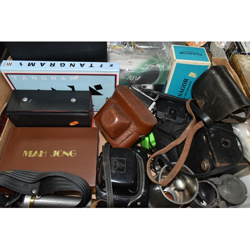 470 - A BOX OF PHOTOGRAPHIC EQUIPMENT AND GAMES ETC, to include a Praktica Super TL2 camera body with case... 