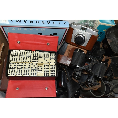 470 - A BOX OF PHOTOGRAPHIC EQUIPMENT AND GAMES ETC, to include a Praktica Super TL2 camera body with case... 