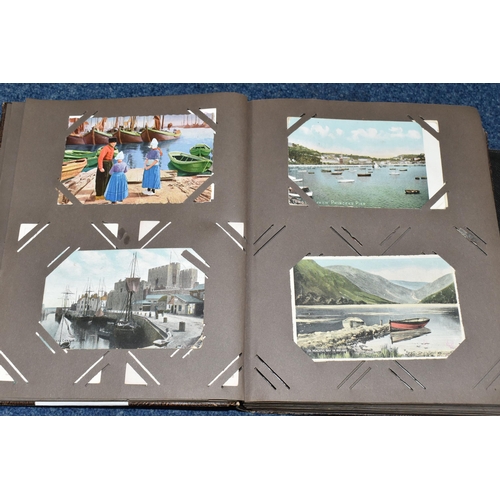 479 - TWO ALBUMS OF POSTCARDS containing approximately 425 examples of liners, ships, boats, barges and ot... 