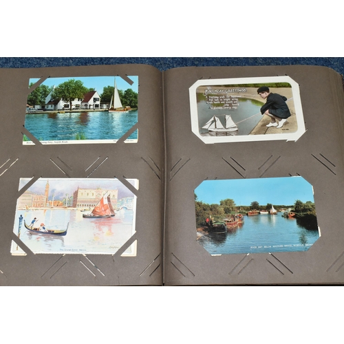 479 - TWO ALBUMS OF POSTCARDS containing approximately 425 examples of liners, ships, boats, barges and ot... 