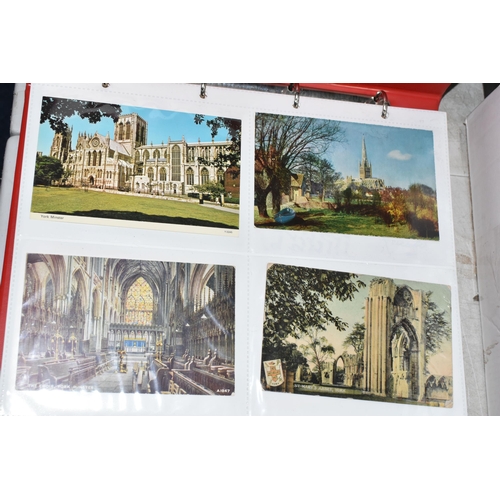 490 - TWO ALBUMS OF POSTCARDS containing approximately 300 examples of castles and churches in England, Sc... 