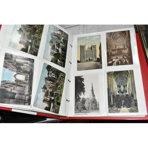 490 - TWO ALBUMS OF POSTCARDS containing approximately 300 examples of castles and churches in England, Sc... 