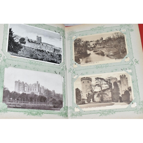 490 - TWO ALBUMS OF POSTCARDS containing approximately 300 examples of castles and churches in England, Sc... 