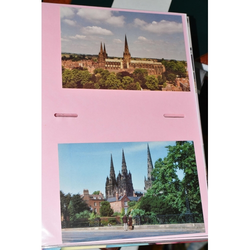 498 - FIVE ALBUMS OF POSTCARDS containing approximately 545 examples of places, streets, buildings, the ca... 