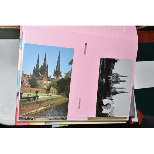 498 - FIVE ALBUMS OF POSTCARDS containing approximately 545 examples of places, streets, buildings, the ca... 