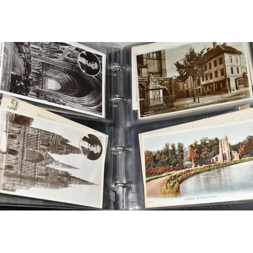 498 - FIVE ALBUMS OF POSTCARDS containing approximately 545 examples of places, streets, buildings, the ca... 