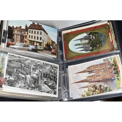 498 - FIVE ALBUMS OF POSTCARDS containing approximately 545 examples of places, streets, buildings, the ca... 