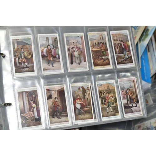 507 - ONE BOX OF CIGARETTE / TRADE CARDS & POSTCARDS in four albums and loose, cigarette card manufacturer... 