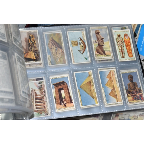 507 - ONE BOX OF CIGARETTE / TRADE CARDS & POSTCARDS in four albums and loose, cigarette card manufacturer... 