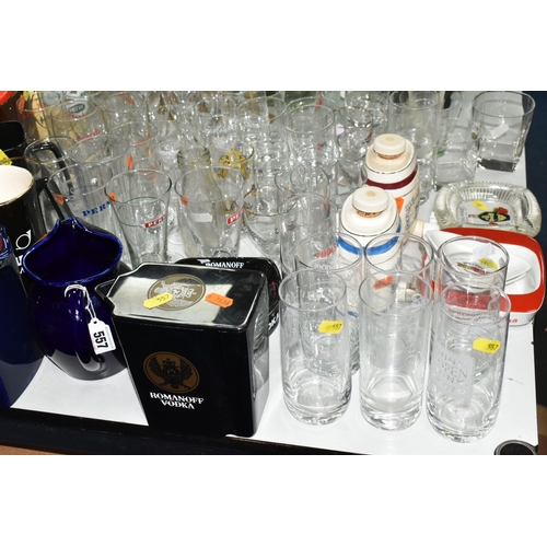 557 - A LARGE COLLECTION OF BREWERIANA, comprising glasses, water jugs, decanters and ashtrays, four boxed... 