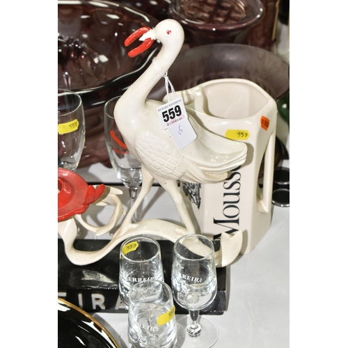 559 - BREWERIANA: comprising a 1960's Ferreira Port bar display stand with two opposing Emu, symbolises fu... 