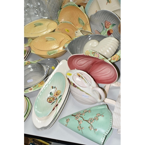 563 - A LARGE COLLECTION OF SHORTER & SONS HAND PAINTED TABLEWARE, comprising three 'Peach' dishes in gree... 