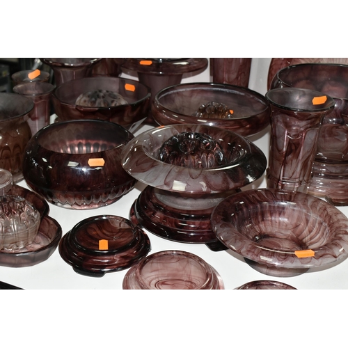 568 - A QUANTITY OF PURPLE RICHARDSONS CLOUD GLASS WARES, to include a pair of vases, approximate height 2... 