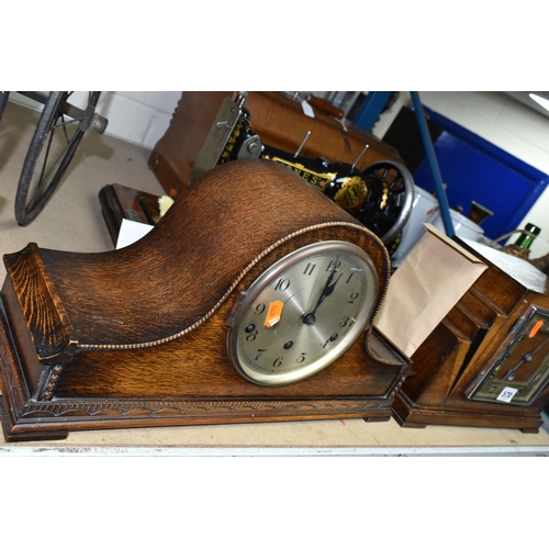 570 - TWO CLOCKS AND A MANUAL SEWING MACHINE, comprising an Rugos oak cased Westminster chiming mantle clo... 