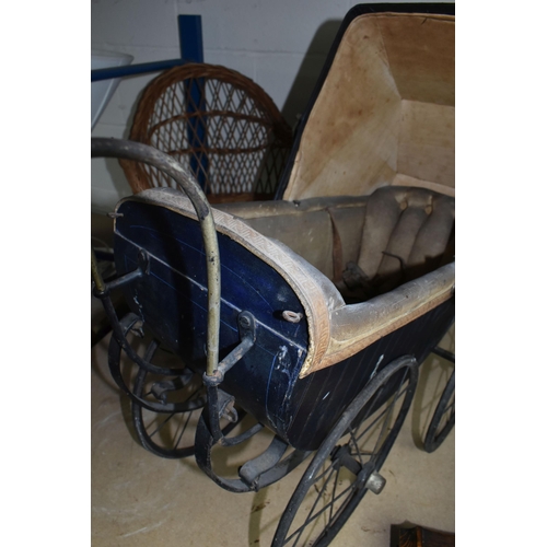 571 - AN ANTIQUE CHILDRENS DOLLS PRAM, together with a small wicker chair, Condition Report: pram in need ... 