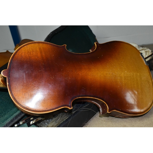 578 - TWO EARLY 20TH CENTURY VIOLINS, both Czechoslovakian made, one has a paper label inside  K.H. ' Made... 