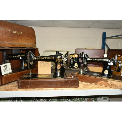 584 - THREE VICTORIAN SINGER SEWING MACHINES, comprising a Singer Model 66K sewing machine, decorated with... 