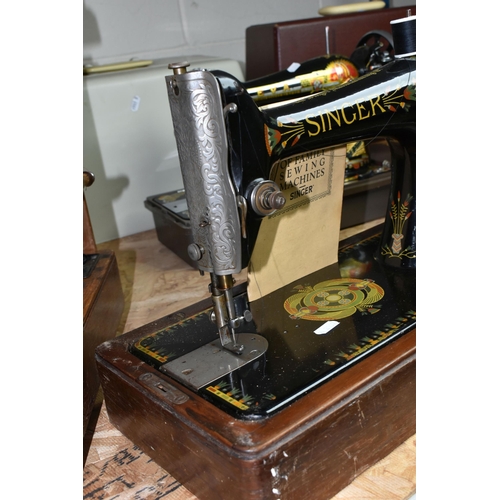 584 - THREE VICTORIAN SINGER SEWING MACHINES, comprising a Singer Model 66K sewing machine, decorated with... 