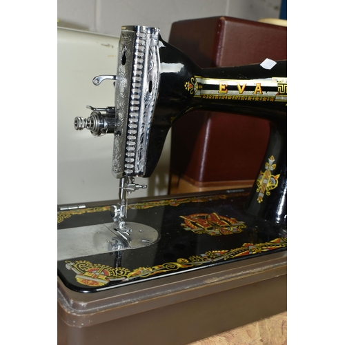 584 - THREE VICTORIAN SINGER SEWING MACHINES, comprising a Singer Model 66K sewing machine, decorated with... 