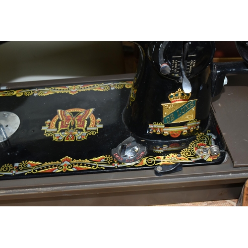 584 - THREE VICTORIAN SINGER SEWING MACHINES, comprising a Singer Model 66K sewing machine, decorated with... 