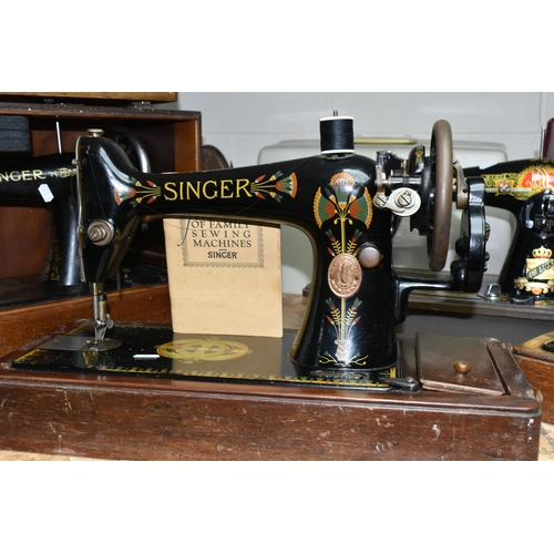 584 - THREE VICTORIAN SINGER SEWING MACHINES, comprising a Singer Model 66K sewing machine, decorated with... 