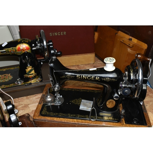 584 - THREE VICTORIAN SINGER SEWING MACHINES, comprising a Singer Model 66K sewing machine, decorated with... 