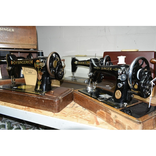 584 - THREE VICTORIAN SINGER SEWING MACHINES, comprising a Singer Model 66K sewing machine, decorated with... 