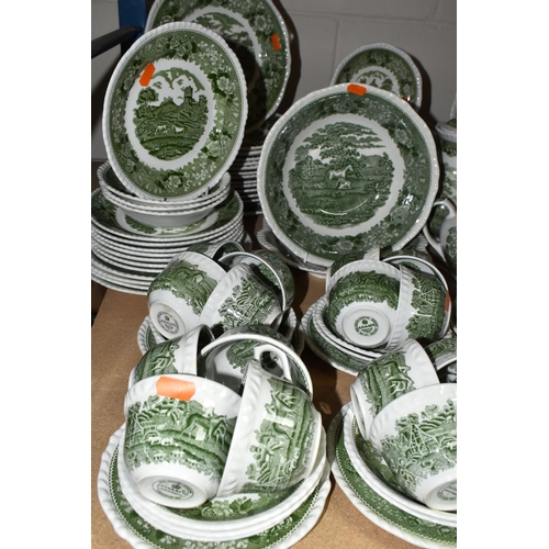 585 - A LARGE QUANTITY OF ADAMS GREEN AND WHITE 'ENGLISH SCENIC' PATTERN DINNERWARE, comprising two covere... 