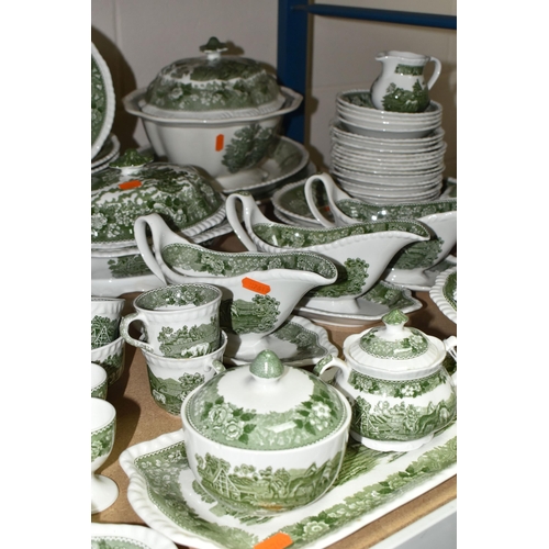 585 - A LARGE QUANTITY OF ADAMS GREEN AND WHITE 'ENGLISH SCENIC' PATTERN DINNERWARE, comprising two covere... 