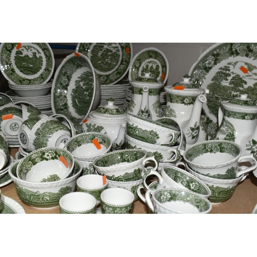 585 - A LARGE QUANTITY OF ADAMS GREEN AND WHITE 'ENGLISH SCENIC' PATTERN DINNERWARE, comprising two covere... 