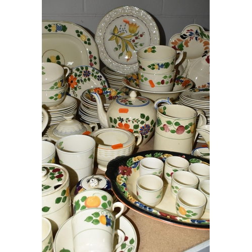 594 - A LARGE QUANTITY OF ADAM'S HANDPAINTED TITIAN WARE, comprising two covered tureens, gravy jug (crack... 