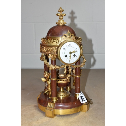 602 - A LATE 19TH CENTURY MARBLE AND GILT METAL MANTEL CLOCK IN THE FORM OF A FOUR COLUMN ROTUNDA TEMPLE, ... 