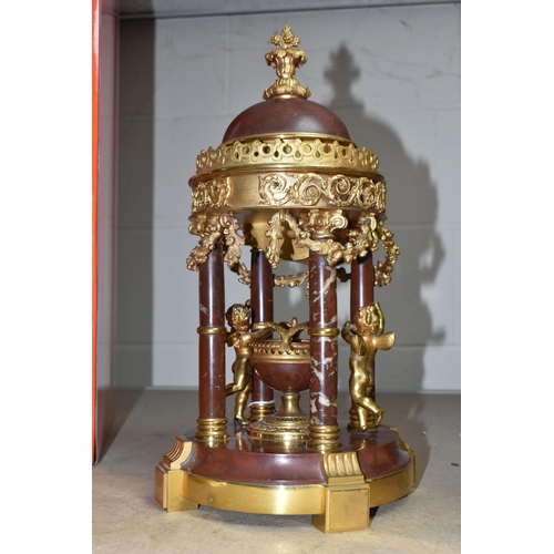 602 - A LATE 19TH CENTURY MARBLE AND GILT METAL MANTEL CLOCK IN THE FORM OF A FOUR COLUMN ROTUNDA TEMPLE, ... 