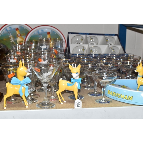 604 - A COLLECTION OF BABYCHAM AND SIMILAR VINTAGE BREWERIANA, to include twelve 1950s Babycham glasses wi... 