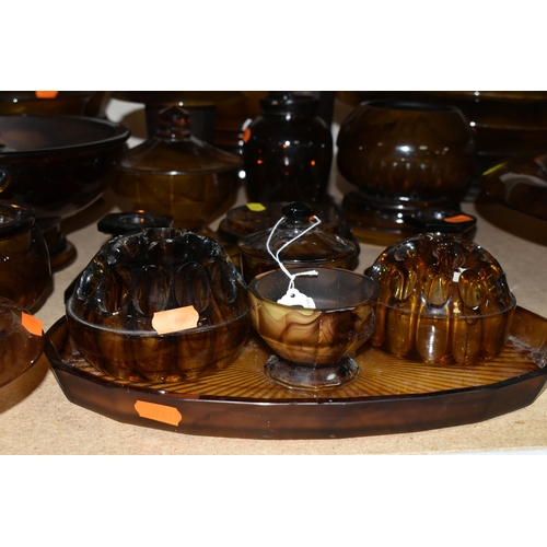 605 - A QUANTITY OF AMBER CLOUD GLASS WARES, approximately thirty items to include vases, bowls with and w... 