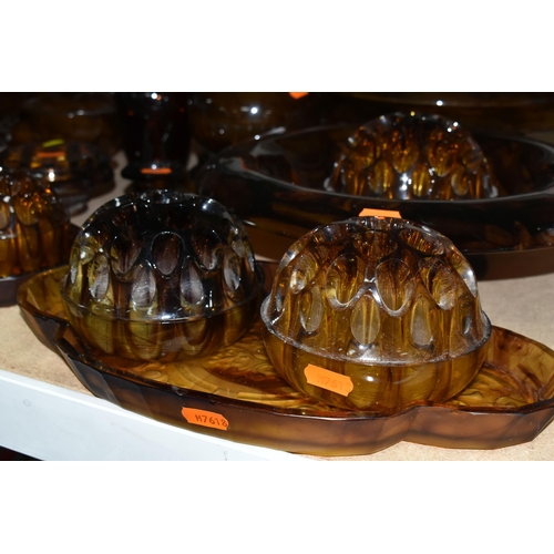 605 - A QUANTITY OF AMBER CLOUD GLASS WARES, approximately thirty items to include vases, bowls with and w... 