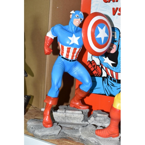 611 - A BOXED ENESCO MARVEL 'CAPTAIN AMERICA VS IRON MAN' FIGURE GROUP, depicting the two superheroes in a... 